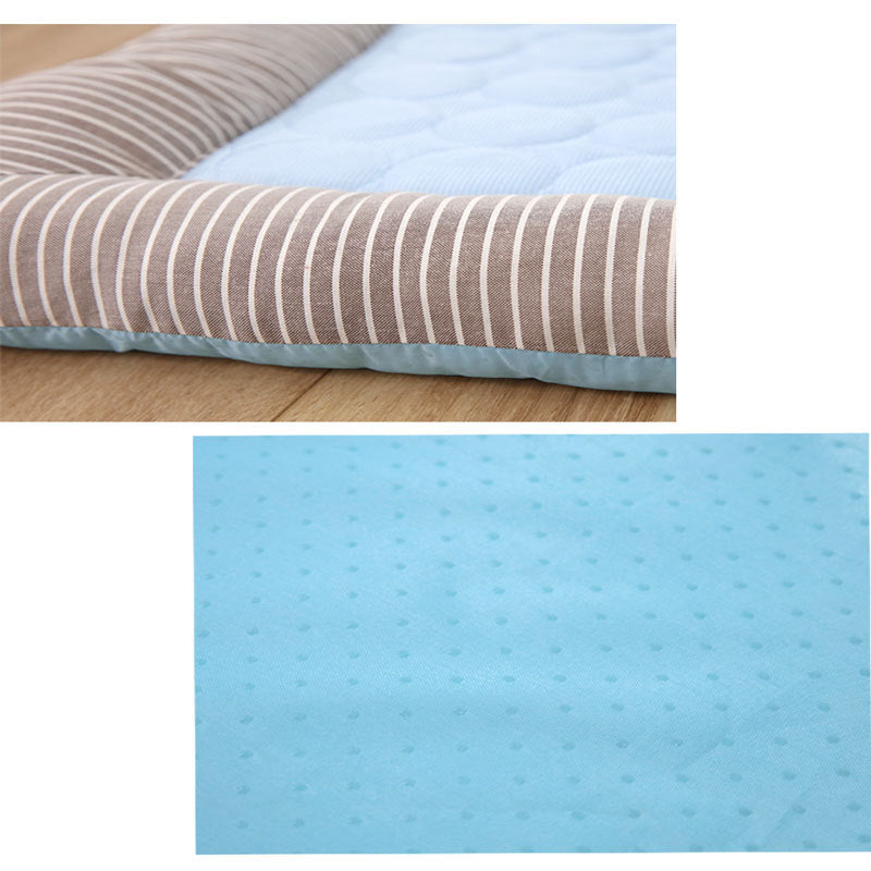 Soft dog cooling blanket for summer with striped cushioned edge and textured blue cooling surface