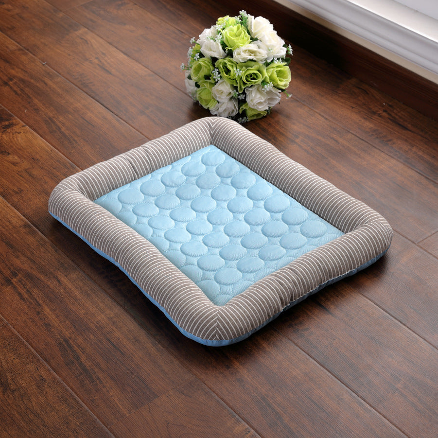 Shopi Vella soft dog cooling blanket for summer with blue quilted center and striped cushioned edges