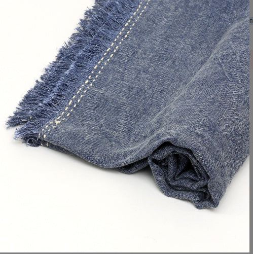 Shopi Vella soft living room blanket for adults in blue with fringed edges and stitched detail