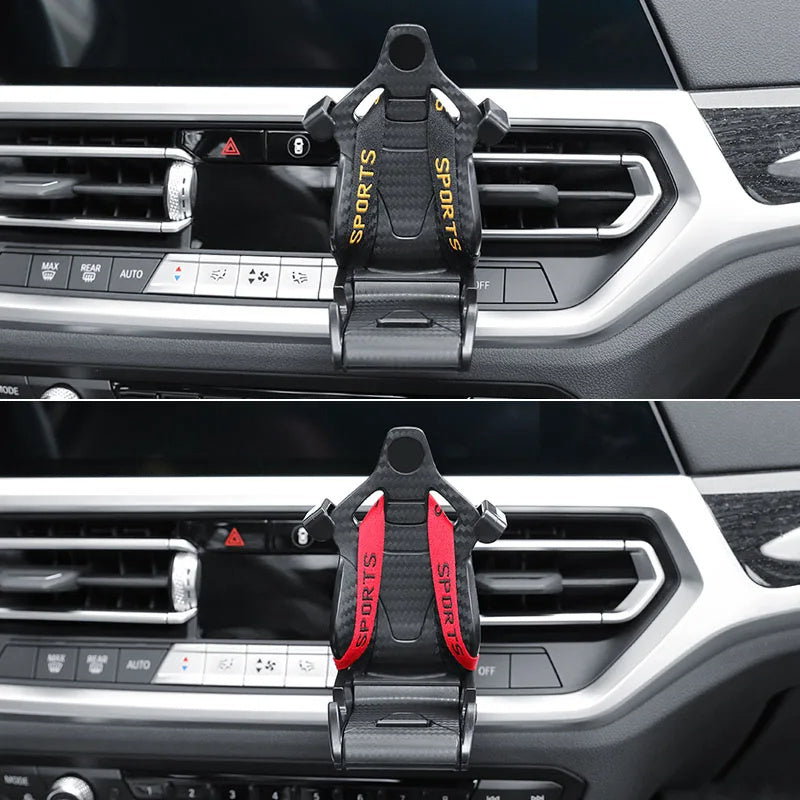 Shopi Vella racing seat car phone holder in black with red and yellow straps mounted on car air vent