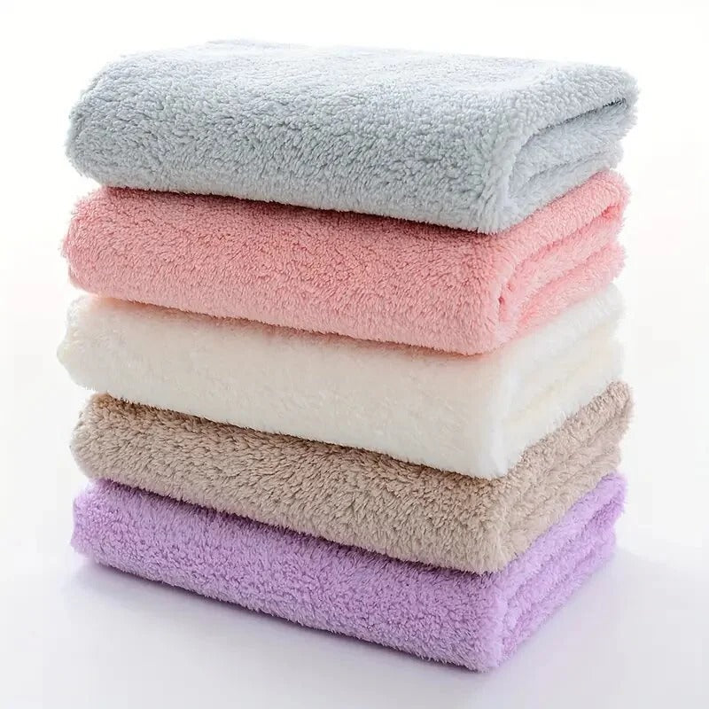 Shopi Vella stack of soft solid color travel towels in gray pink white beige and purple
