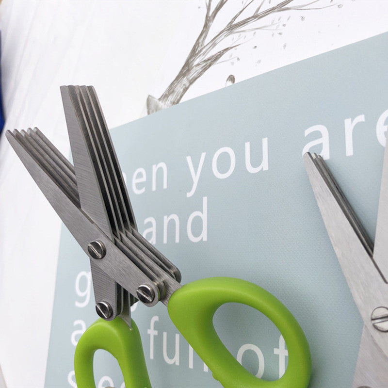 Shopi Vella stainless steel herb scissors with green handles for efficient kitchen storage and herb cutting