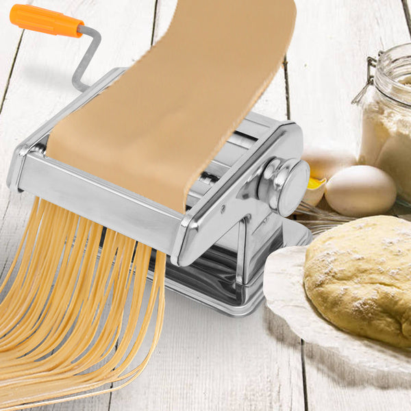 Shopi Vella stainless steel manual laminating machine cutting fresh pasta dough on wooden table
