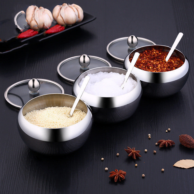 Shopi Vella stainless steel seasoning pot set with three bowls containing spices and sugar with lids and spoons