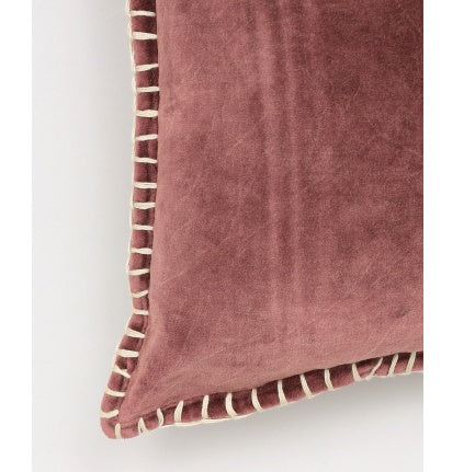 Stonewashed cotton velvet throw pillow case in dusty rose with white stitched edges by Shopi Vella