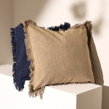 Shopi Vella stonewashed linen throw pillow with fringed edges in neutral beige and navy colors