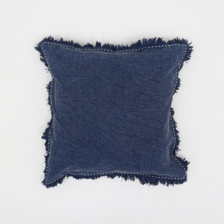 Shopi Vella stonewashed linen throw pillow in navy blue with fringed edges and soft texture