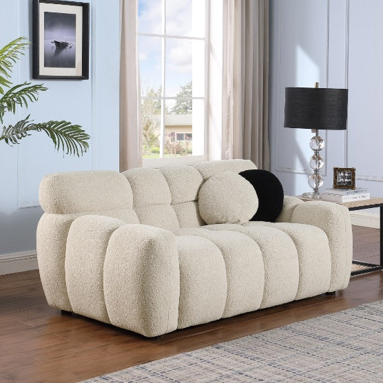 Shopi Vella stylish apartment sofa in beige with plush cushions and rounded design in modern living room