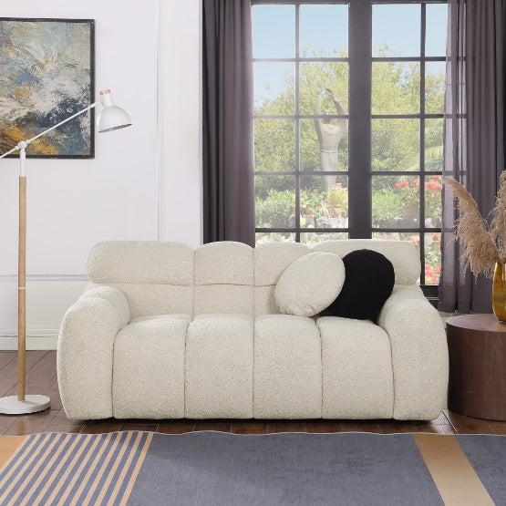 Shopi Vella stylish apartment sofa in cream with plush cushions in a modern living room setting