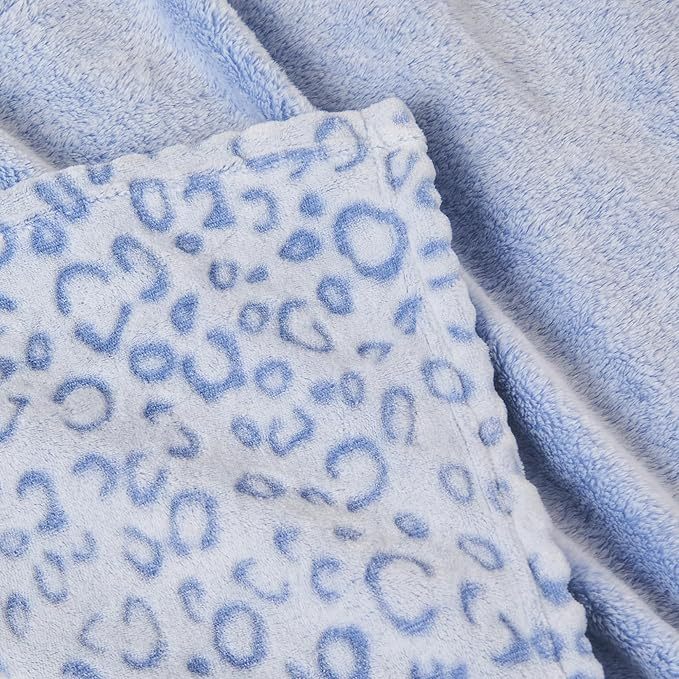 Shopi Vella super soft women's blanket in blue with plush texture and subtle leopard print pattern