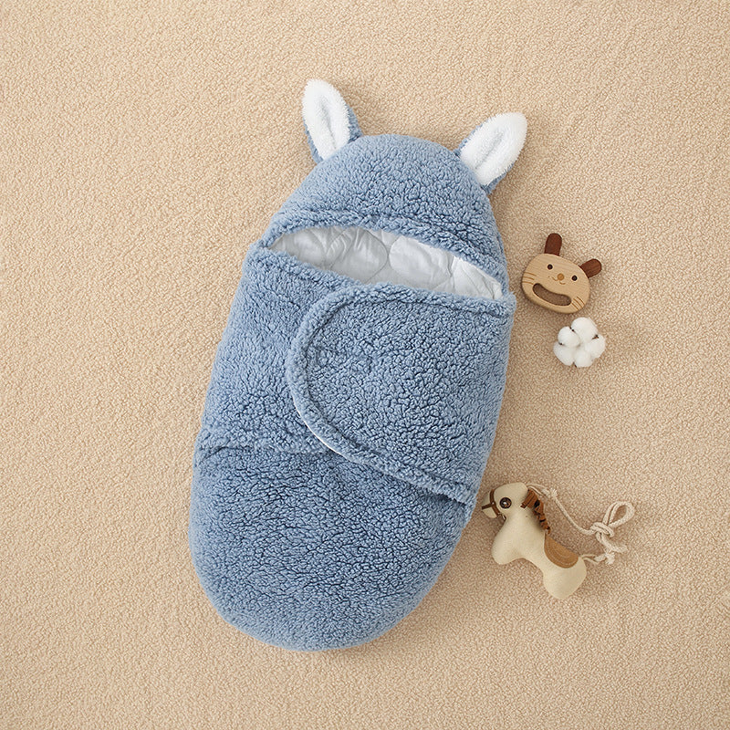 Shopi Vella thick winter baby quilt in blue with hood and ears for cozy infant warmth