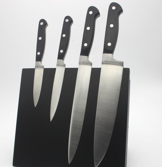 Shopi Vella knife set displayed on a black tool storage rack organizer with four stainless steel blades