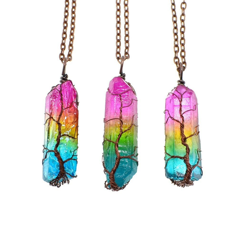 Tree of life crystal pendant necklace with rainbow gradient and wire tree design on bronze chain