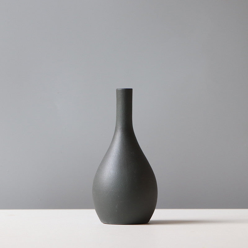 Minimalist dark gray vase suitable for use on a TV cabinet flower stand for home storage