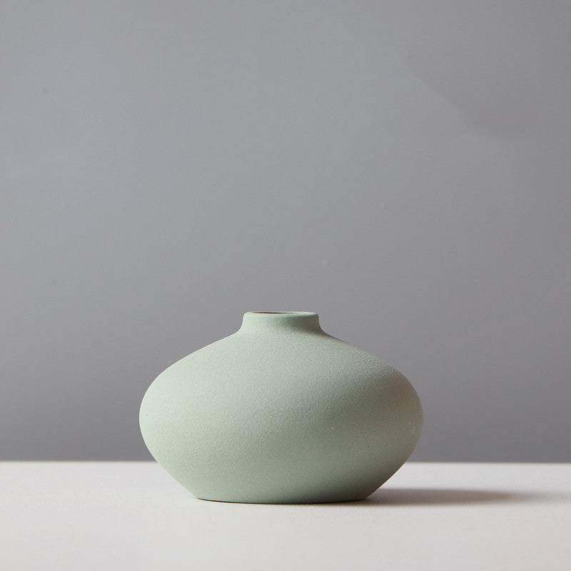 Minimalist light green ceramic vase for TV cabinet flower stand by Shopi Vella