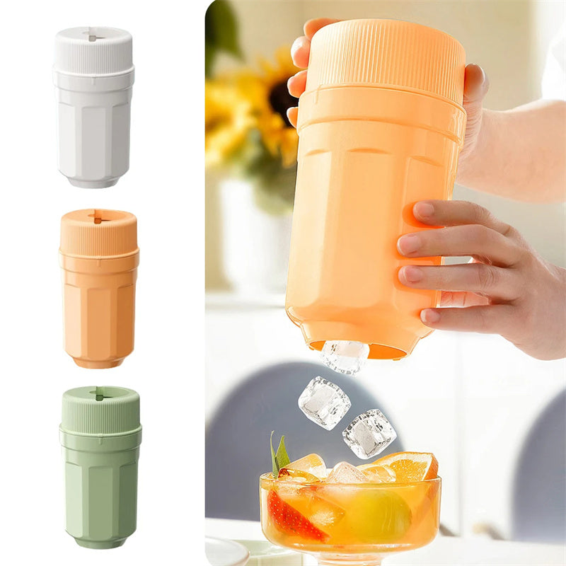 Shopi Vella twisting ice cup mold for freezer in orange, white, and green colors releasing ice cubes into a glass
