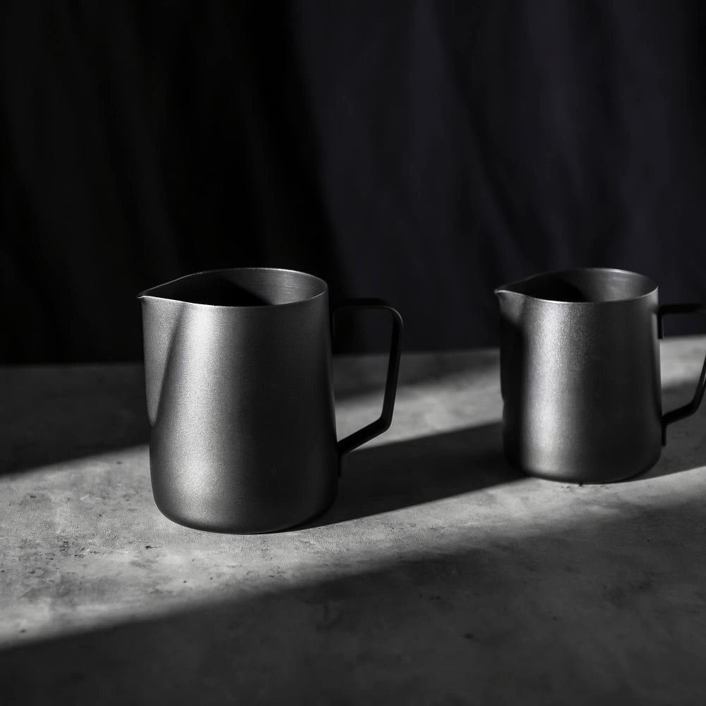 Shopi Vella stainless steel milk frothing pitcher in matte black for perfect coffee steaming