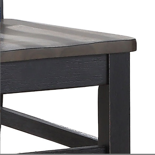 Close-up of Shopi Vella two tone cottage dining table set corner showing dark and light wood tones