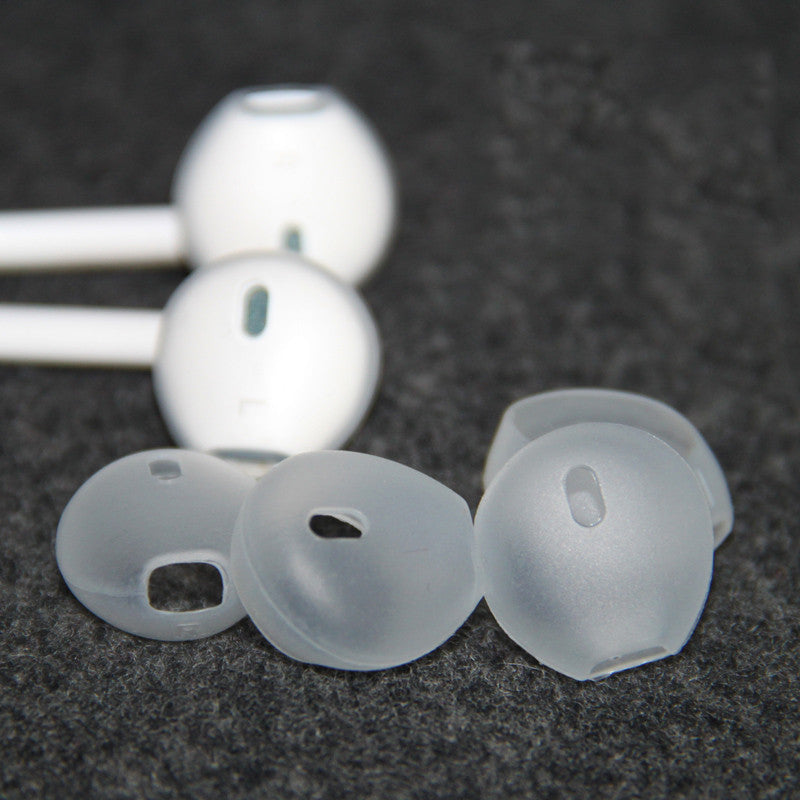 Clear headphone silicone case covers designed for white earbuds on dark surface