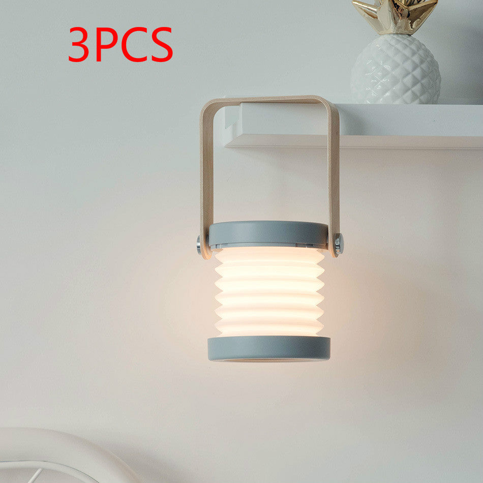 USB rechargeable lantern for home decor hanging under a shelf with a soft glowing light