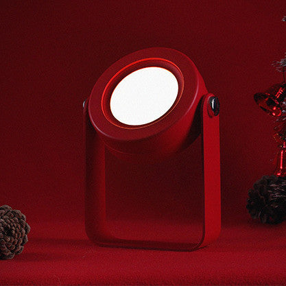 Red USB rechargeable lantern for home decor with modern frame design on red background