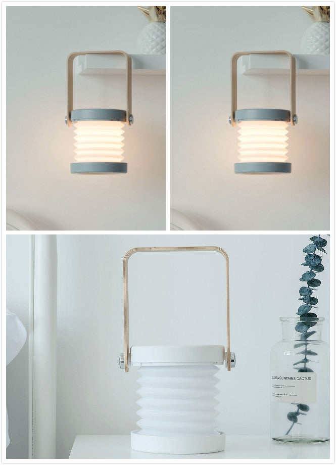 USB rechargeable lantern for home decor with collapsible design and wooden handle in neutral tones