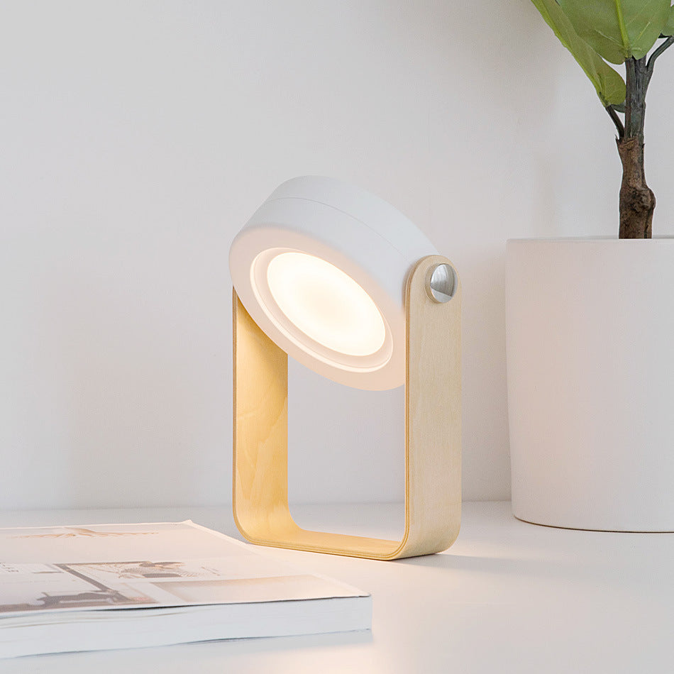USB rechargeable lantern for home decor with modern wooden frame and soft white light on table
