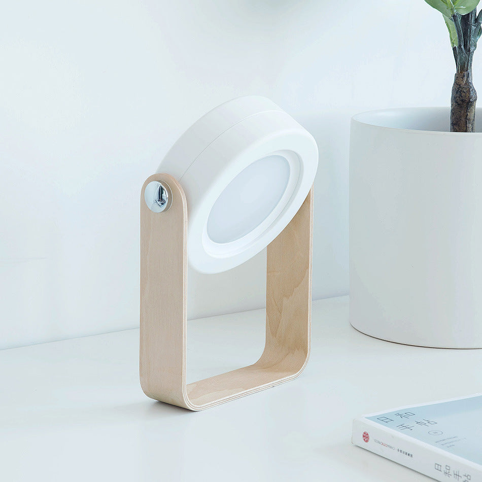 USB rechargeable lantern for home decor with modern wooden frame on white surface