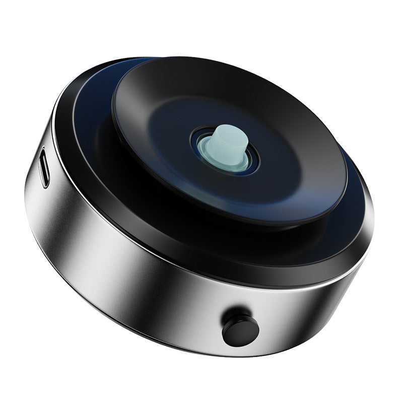Shopi Vella vacuum adsorption phone holder in black with a sleek round design and USB charging port