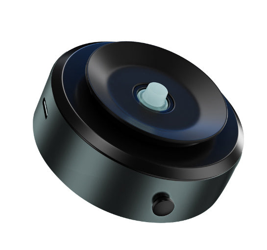 Black vacuum adsorption phone holder with circular design and button for secure phone placement