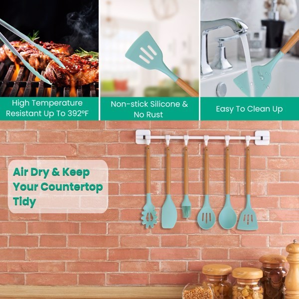 35 piece kitchen utensil set with non-stick silicone utensils hanging on a wall rack in kitchen