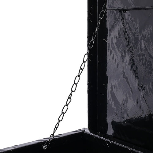 Close-up of chain detail on black 48 inch aluminum truck tool box by Shopi Vella
