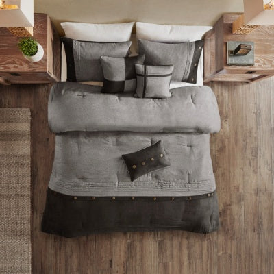 Shopi Vella 7 piece faux suede comforter set in shades of gray and black on bed with matching pillows