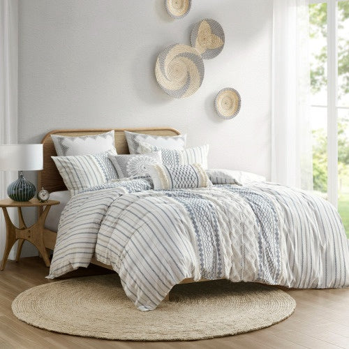 Shopi Vella cal king chenille duvet set on bed with neutral striped and textured design in bright bedroom