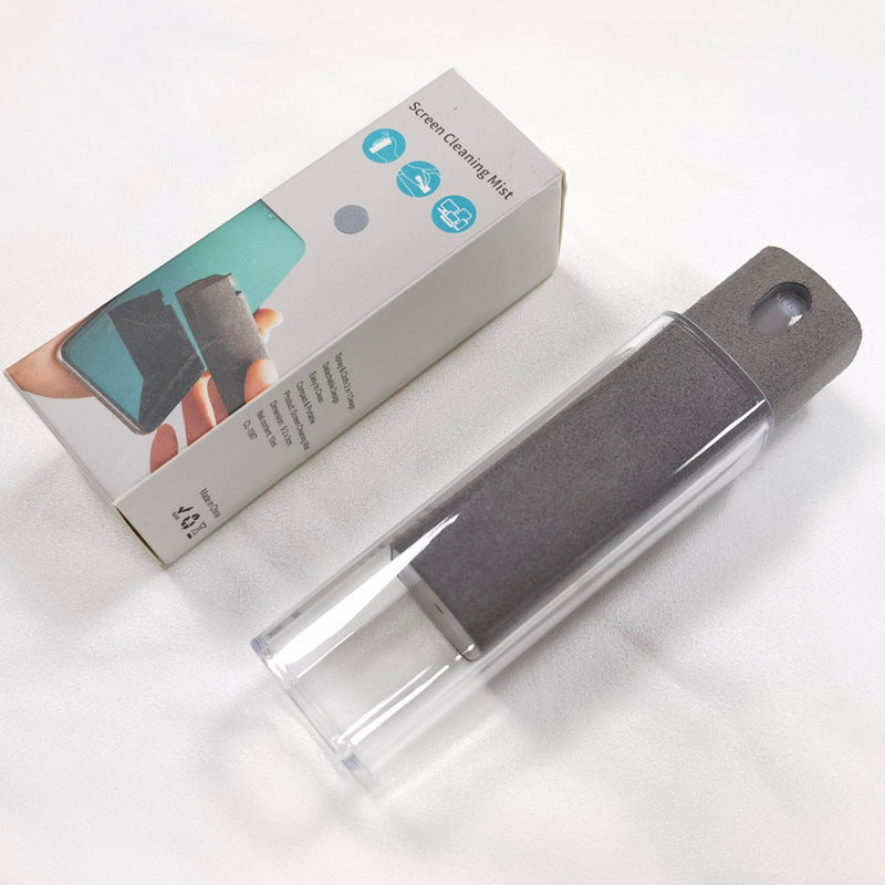 Shopi Vella compact screen cleaner with storage in clear case and gray microfiber cloth beside its packaging box