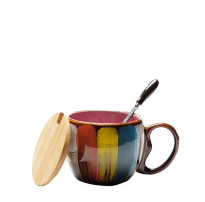 Creative ceramic coffee mug with colorful brushstroke design, wooden lid, and spoon