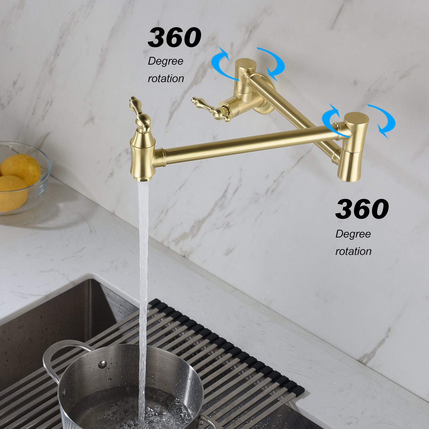 Shopi Vella folding kitchen faucet in gold with 360 degree rotation installed above kitchen sink