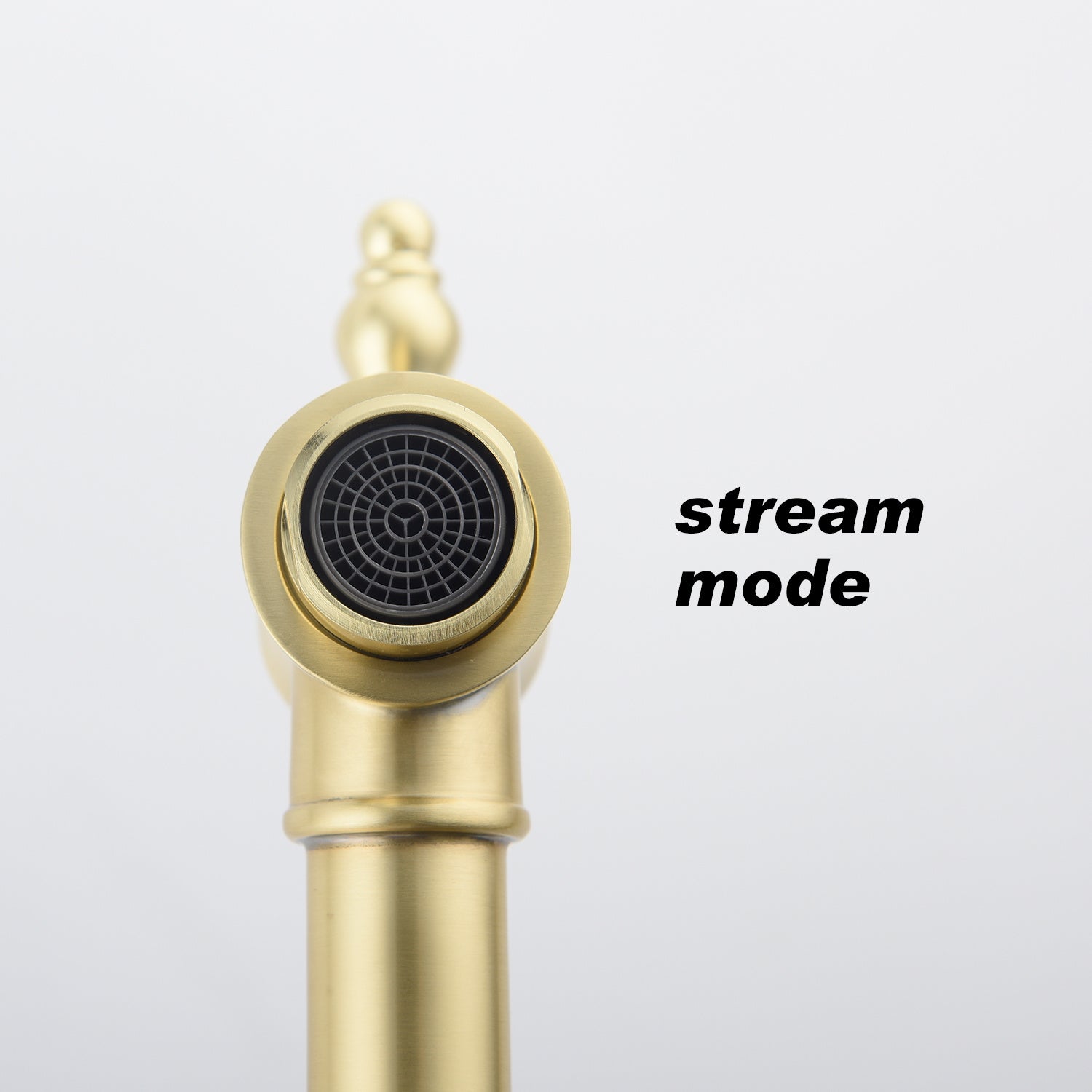 Close-up of a gold folding kitchen faucet showing stream mode for efficient water flow