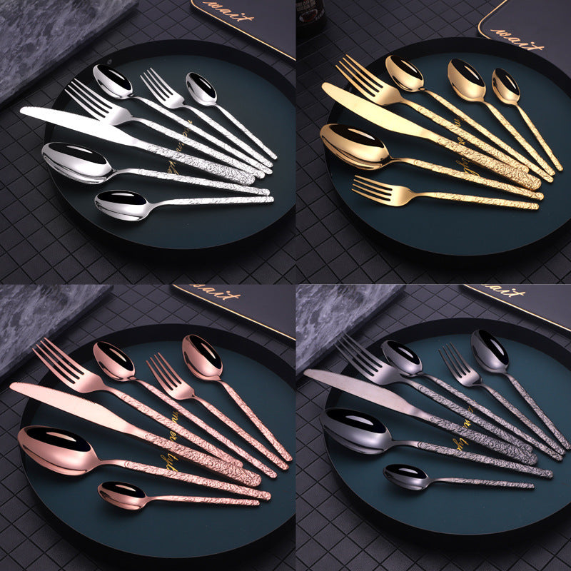 Shopi Vella gold cutlery set for dinner parties with intricate patterned handles in gold color