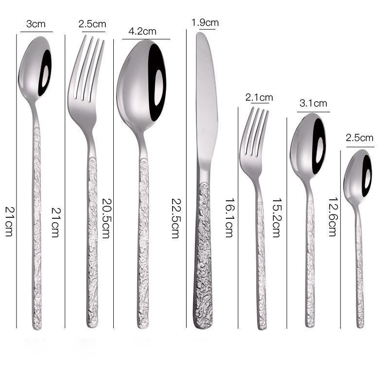 Shopi Vella gold cutlery set for dinner parties with spoons, forks, and knives featuring textured handles