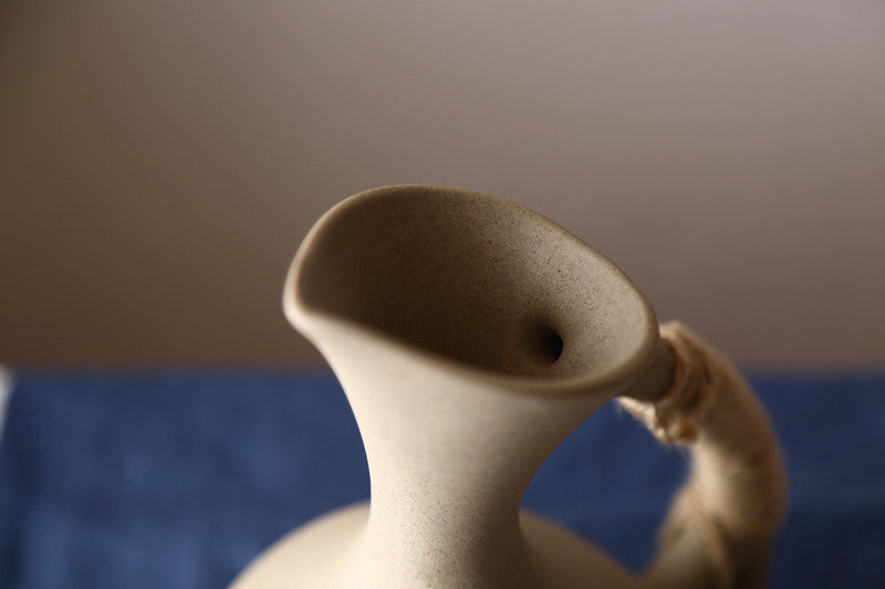 Shopi Vella handcrafted pottery pitcher set made from natural clay with a rustic textured finish