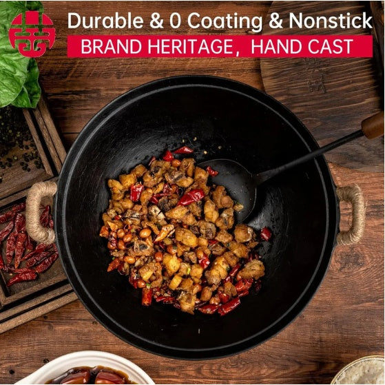Handmade cast iron wok pan with cooked spicy stir-fry on wooden table by Shopi Vella