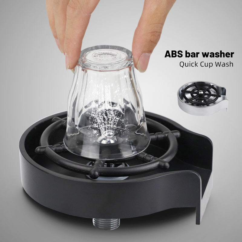 Shopi Vella high pressure cup washer for sink washing a clear glass cup quickly and efficiently