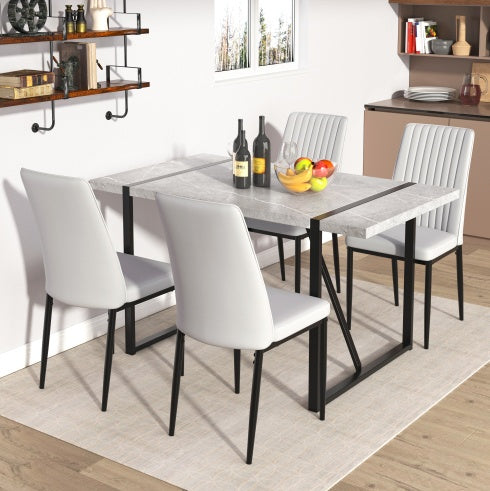 Shopi Vella modern dining table with four white chairs showcasing home office modern furniture style