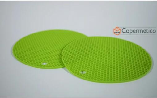 Green stretch silicone food covers with honeycomb texture for kitchen use by Shopi Vella