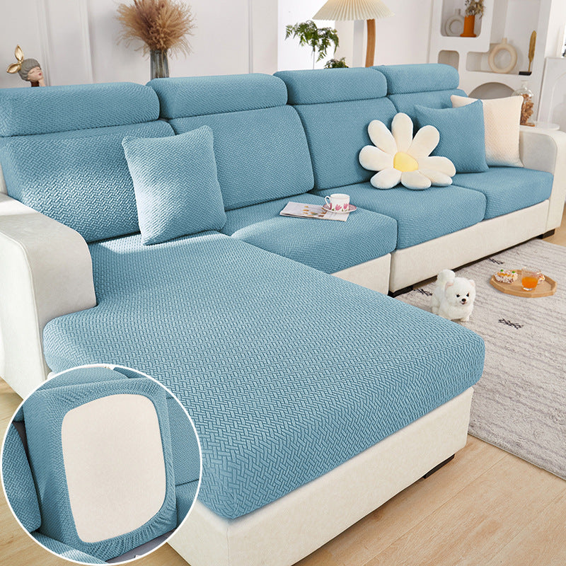 Blue machine washable sofa cushion cover by Shopi Vella on white sectional sofa in modern living room