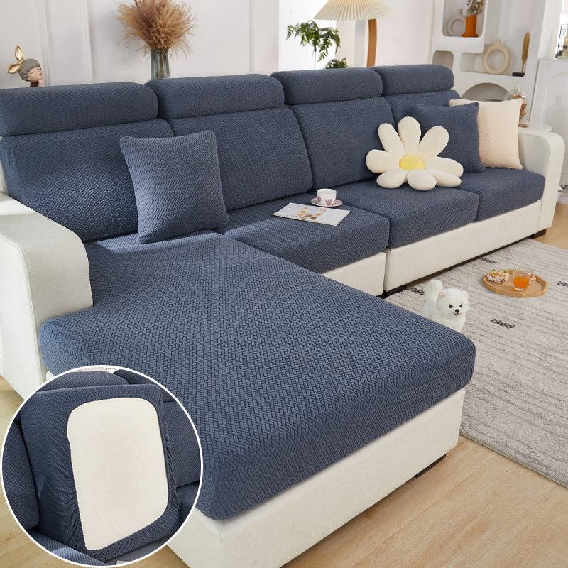 Shopi Vella machine washable sofa cushion cover in dark blue fitted on sectional sofa with decorative pillows