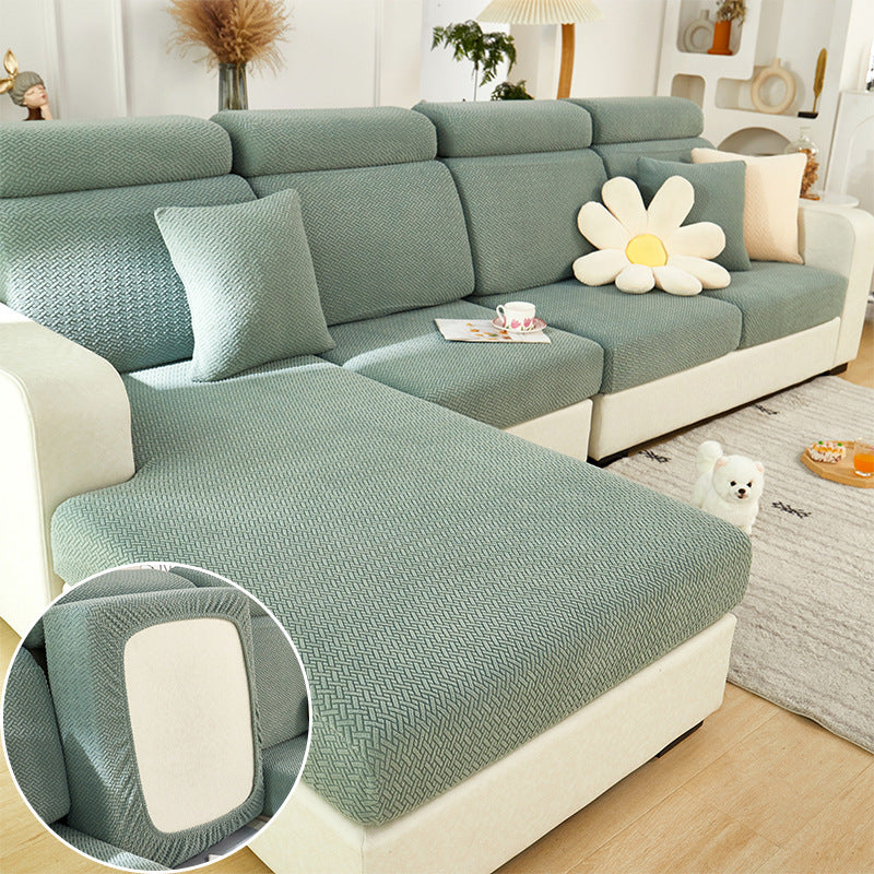Shopi Vella machine washable sofa cushion cover in light green fitted on sectional sofa