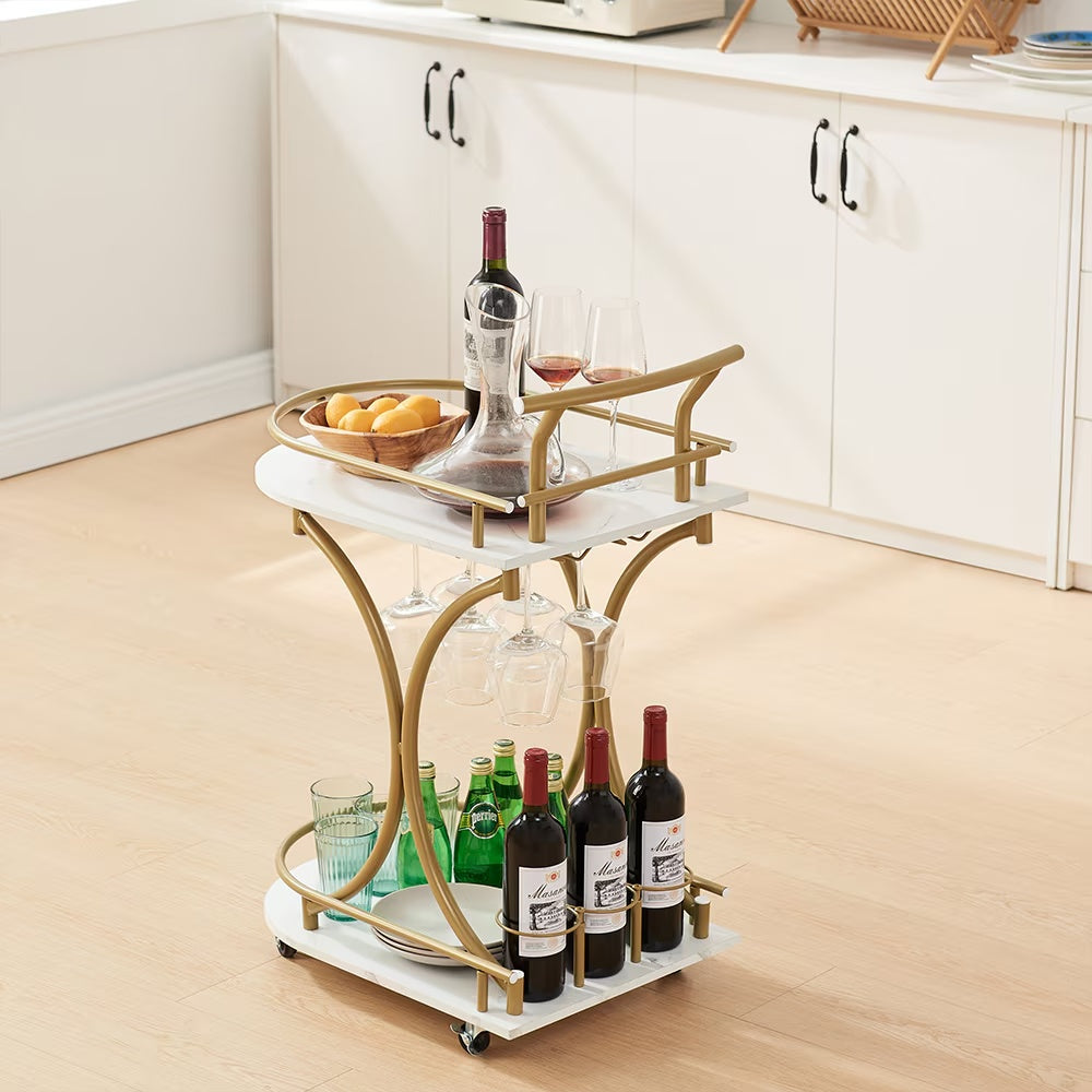 Modern bar trolley for home with gold frame and white shelves holding wine bottles glasses and snacks