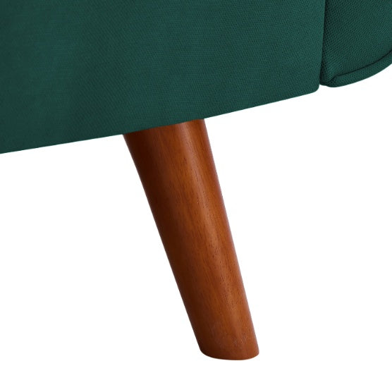 Close-up of wooden leg on green modern fabric sofa for living room by Shopi Vella